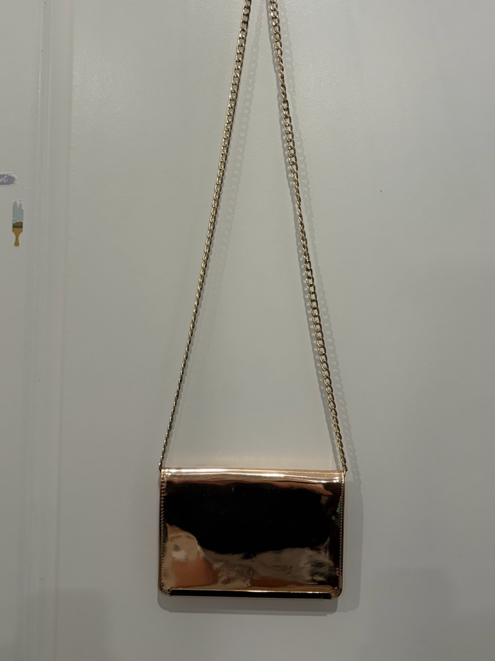 Mossino Shiny Metallic Crossbody Bag in Rose Gold